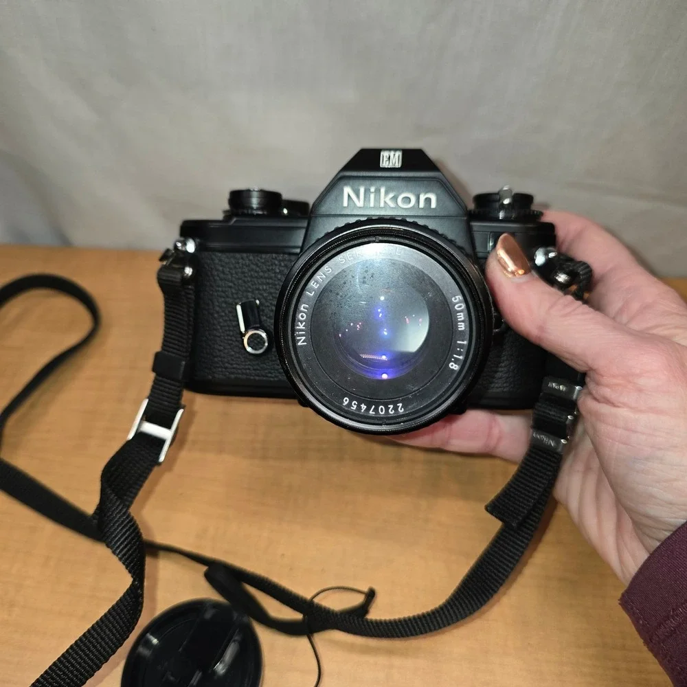 Nikon‎ EM 35mm Camera body lens series e flash cases for camera manuals timer